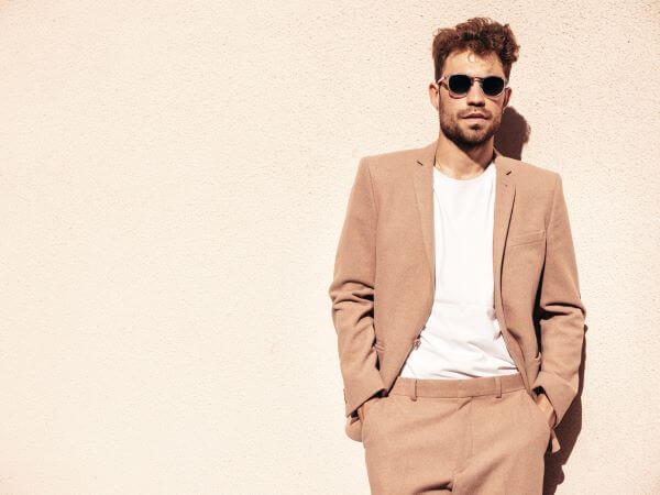 Tan suit and t shirt look