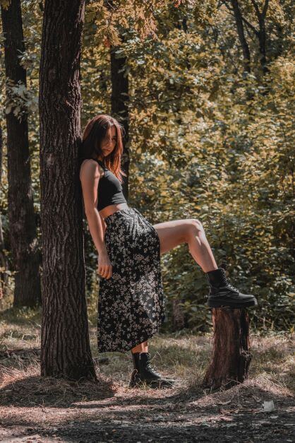 Girl with chunky boots and midi skirt