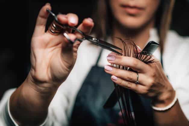 cutting hair with scissors