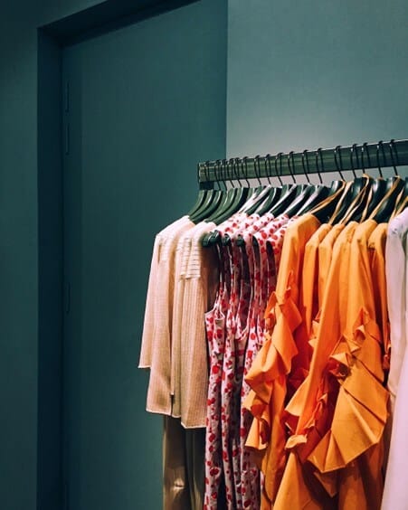 A clothing rail in a designer store