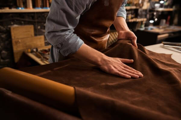 A leather tanner at work