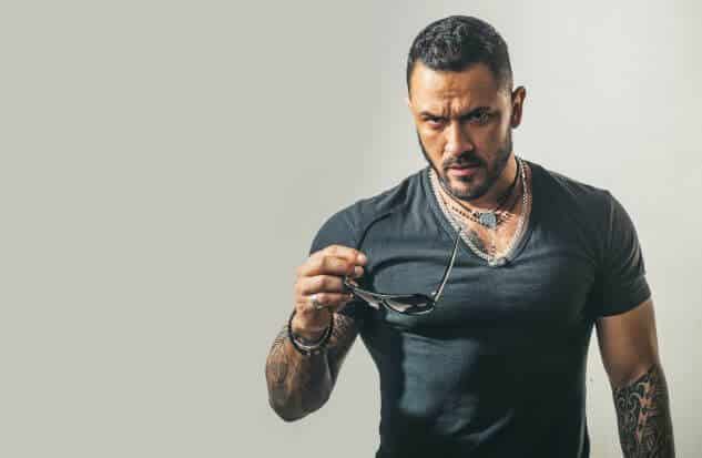 man in tight fitting expensive t shirt