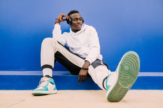 man in tracksuit and trainers