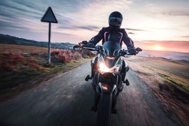 man rides motorbike in the UK
