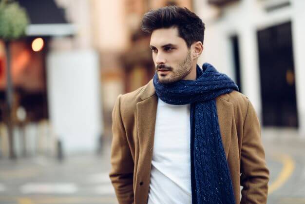 man wearing big scarf