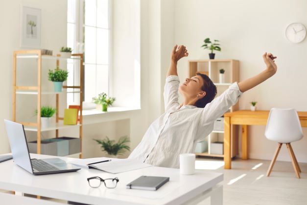 Woman taking a break from laptop