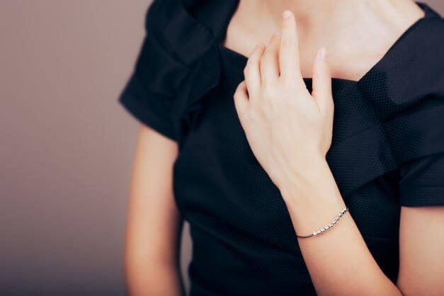 tennis bracelet on arm
