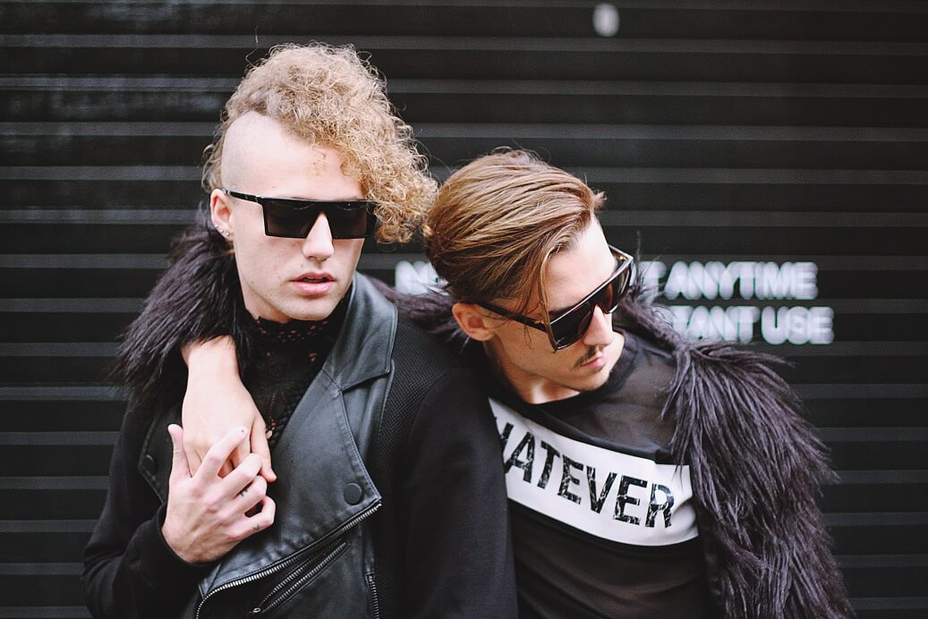 two male models pose