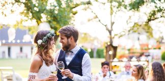a new bride in a stunning wedding reception dress