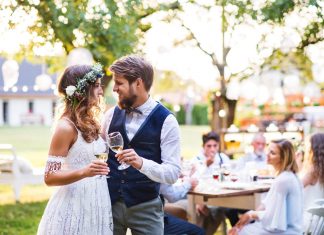 a new bride in a stunning wedding reception dress