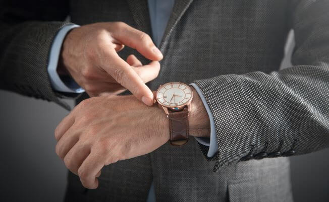 Man winding his watch
