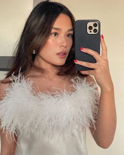 woman in feathered pyjamas